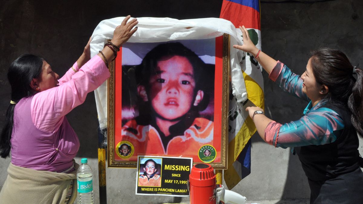 Tibetans show photo of the Panchen lama