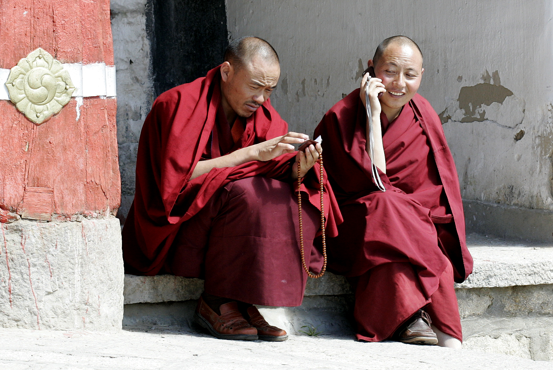 Monks sitting at Tashilumpo Monastery, Shigatse