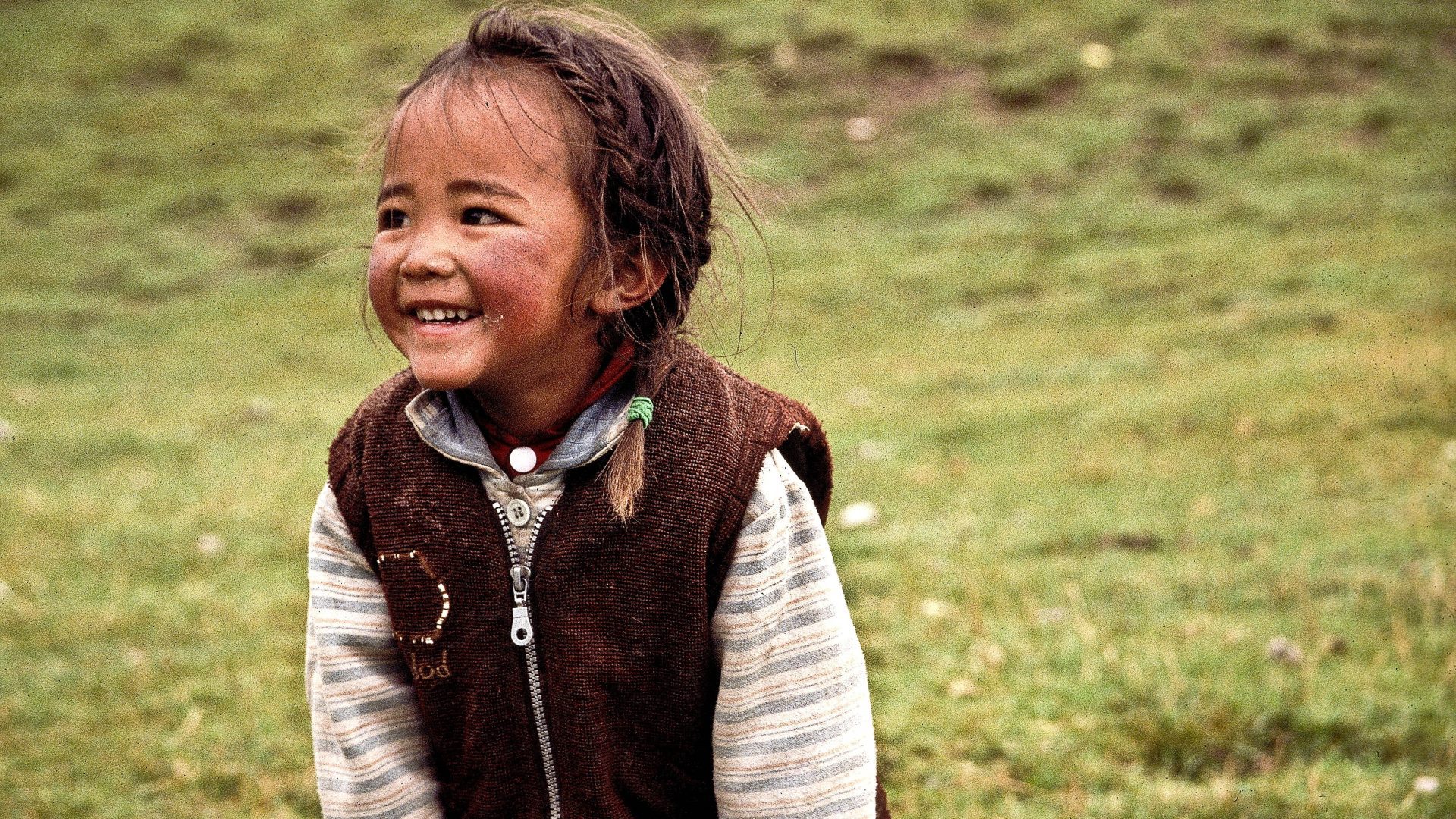 Smiling Tibetan nomad girl