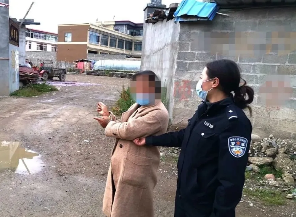 Blurred photo of Rinchen Kyi during her arrest