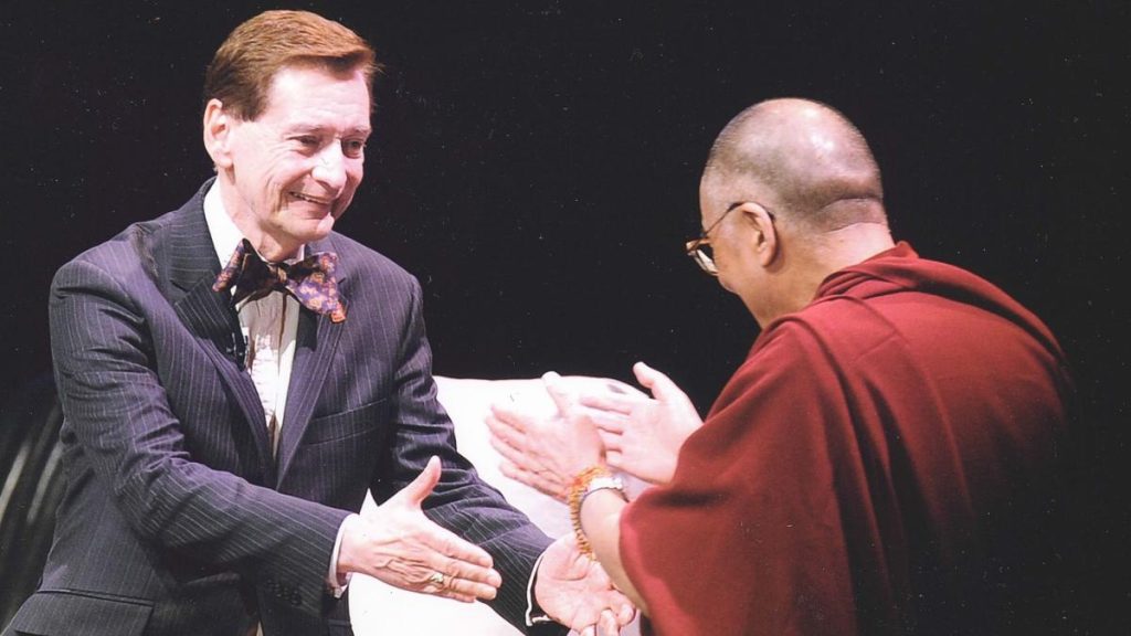 Hyde-Chambers introduces the Dalai Lama at the Royal Albert Hall in 2008