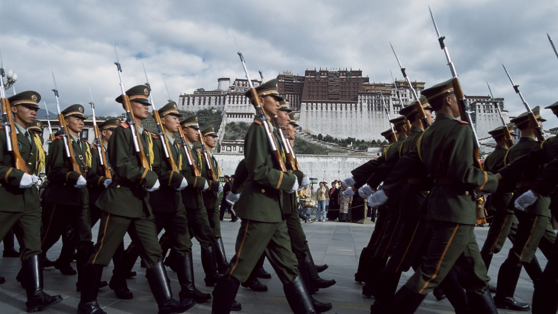 Chinese soldiers marching outside the Potala Palace