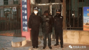 Person in custody in front of the Mangra detention centre, eastern Tibet
