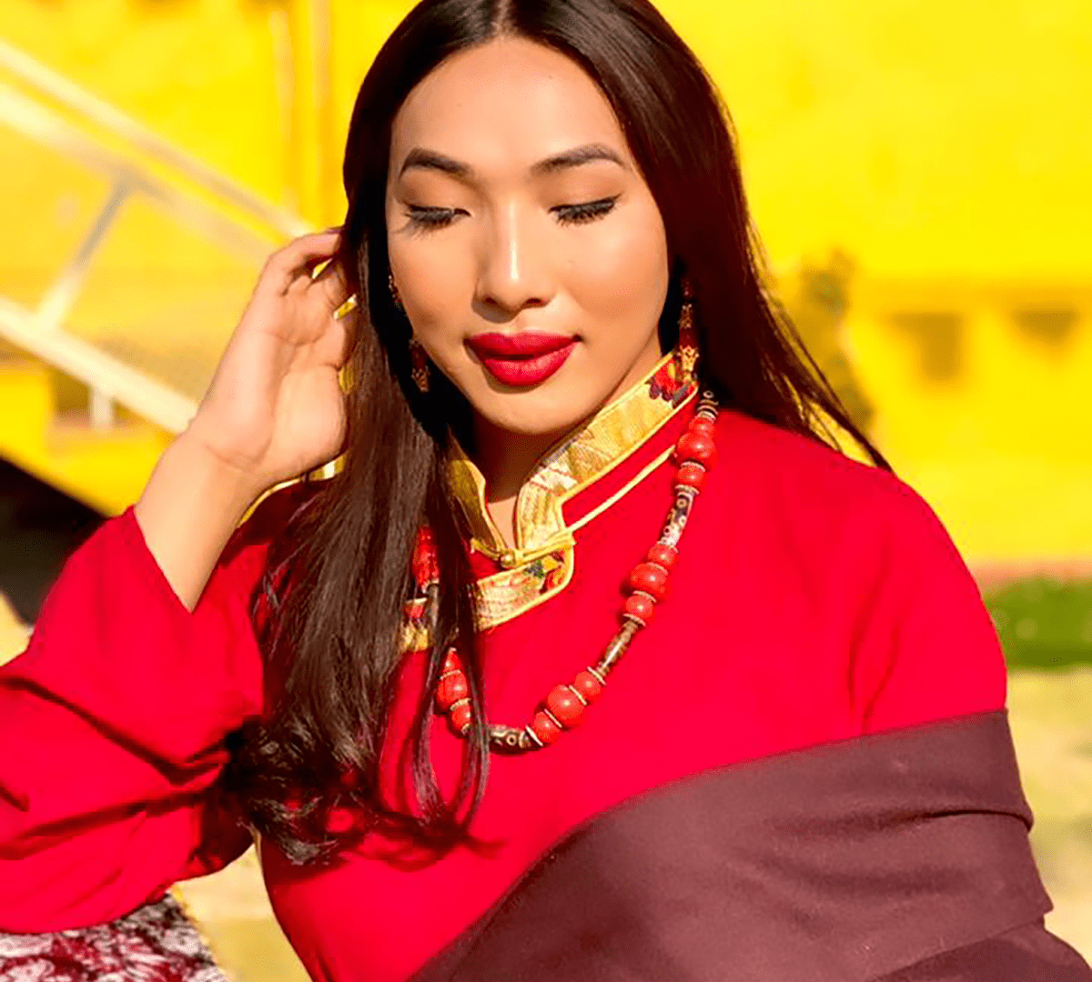 Tenzin Mariko wearing a Khampa Chupa (a traditional Tibetan dress from the Kham region)