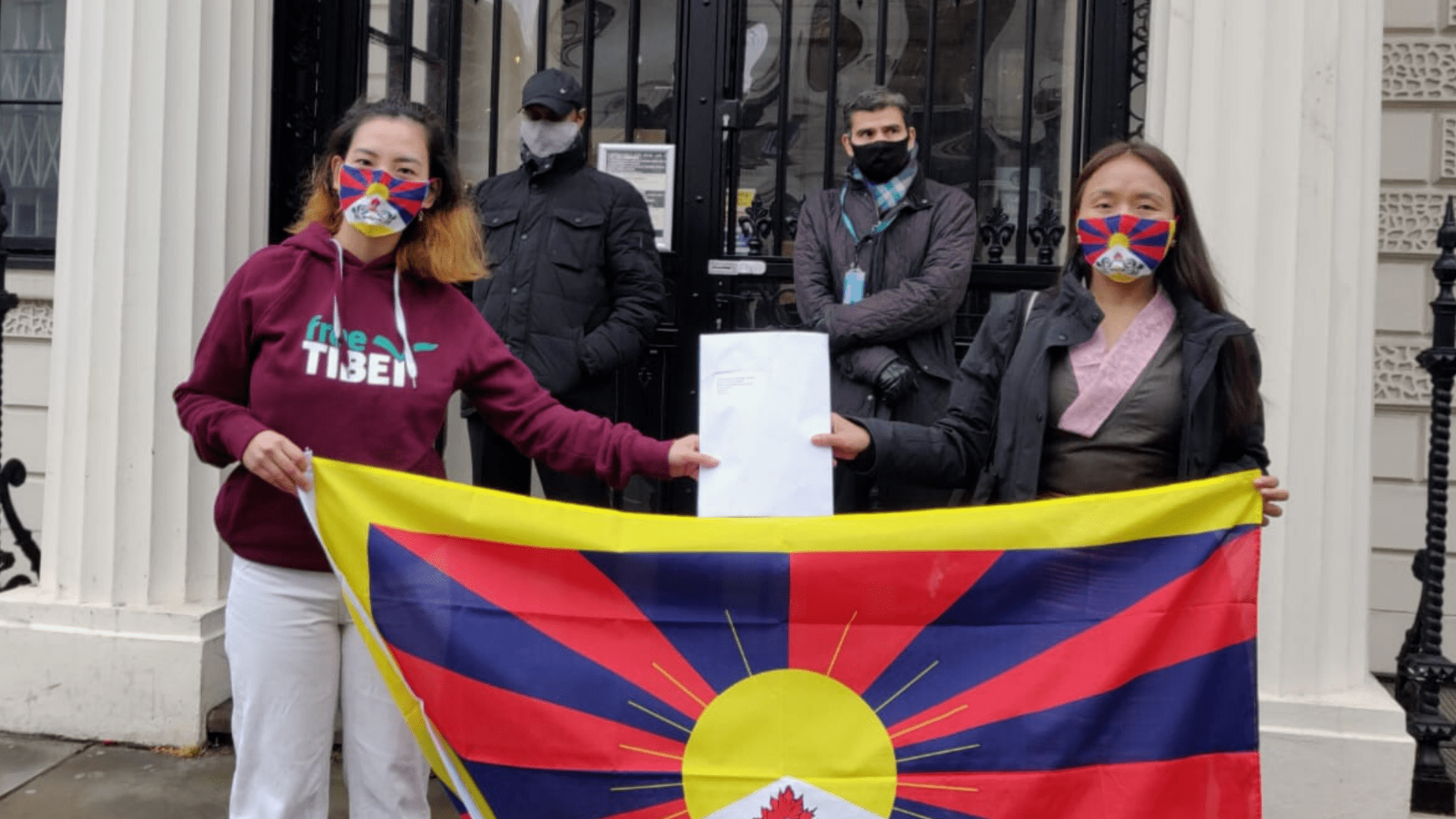 Namgyal (right) delivering a letter from Free Tibet and the Tibetan community to the Chinese embassy