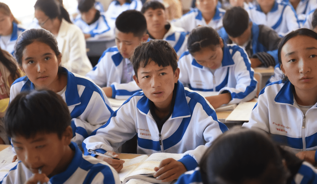 Tibetan children taking classes in a Chinese residential school.